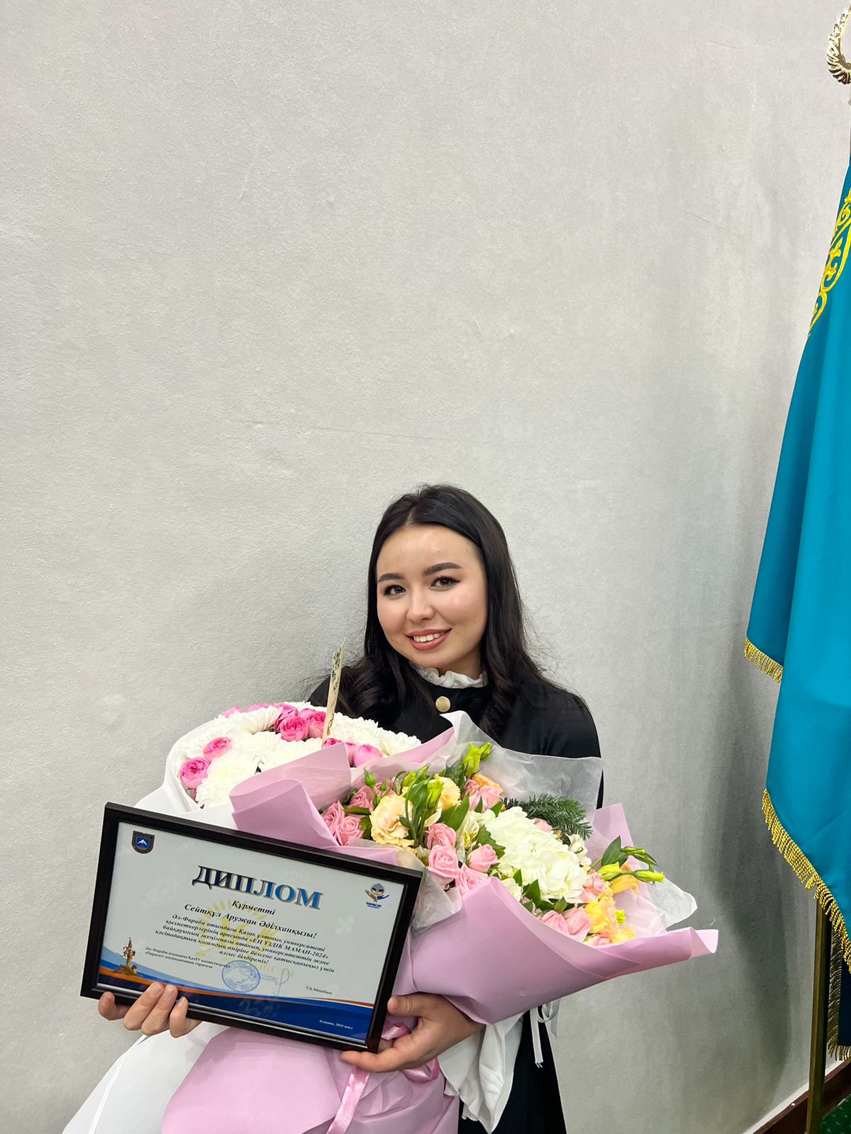 The dean's office employee was awarded