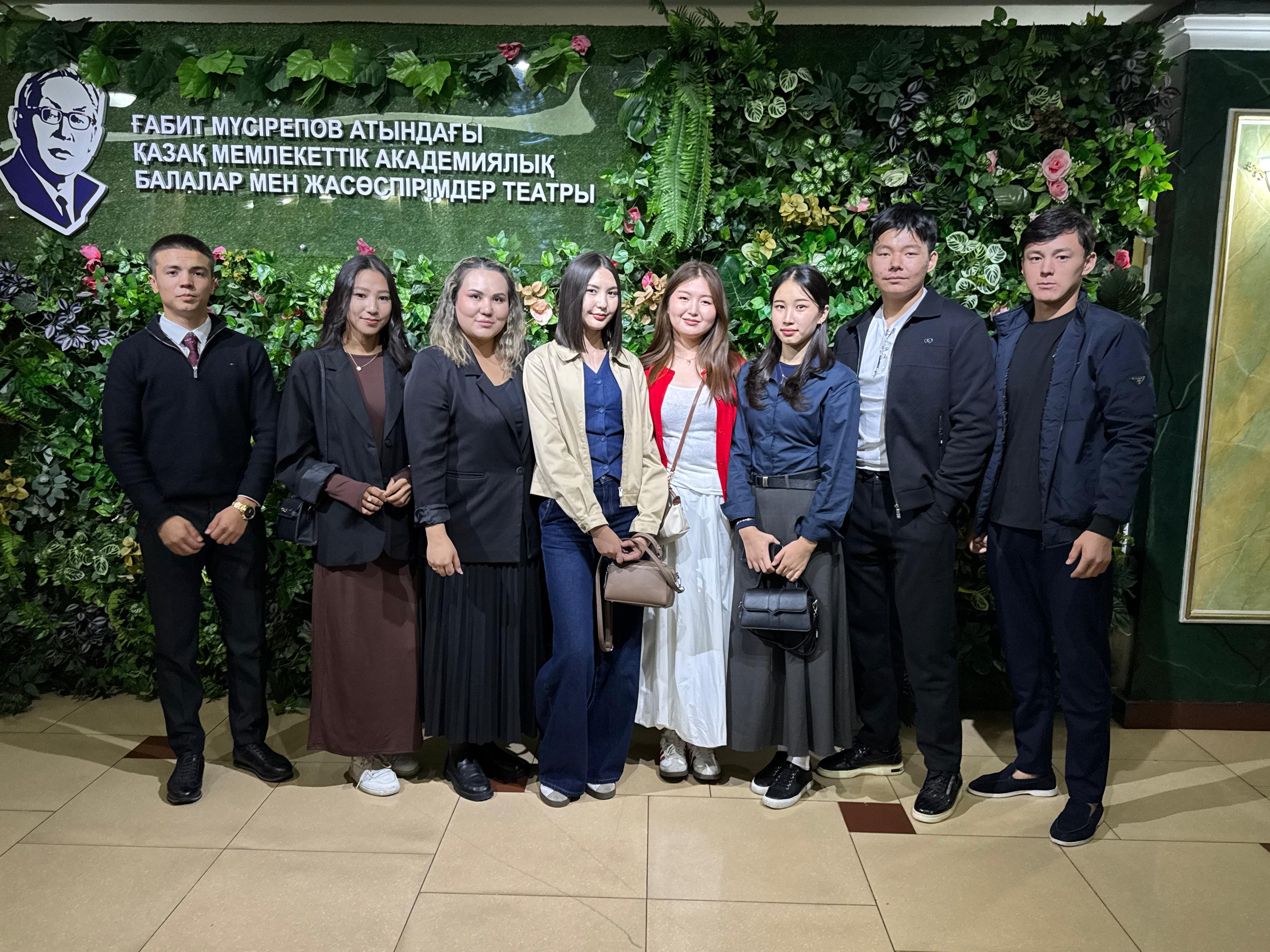 GiMU program, under the guidance of their advisor Asel Asylbekkyzy, visited the Gabit Musrepov Kazakh State Academic Theater for Children and Youth to watch the play "My Shynar with the Red Scarf."