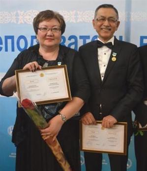 Galiya Akhmetvaliyevna Movkebayeva with rank assignment as the Best University lecturer - 2013